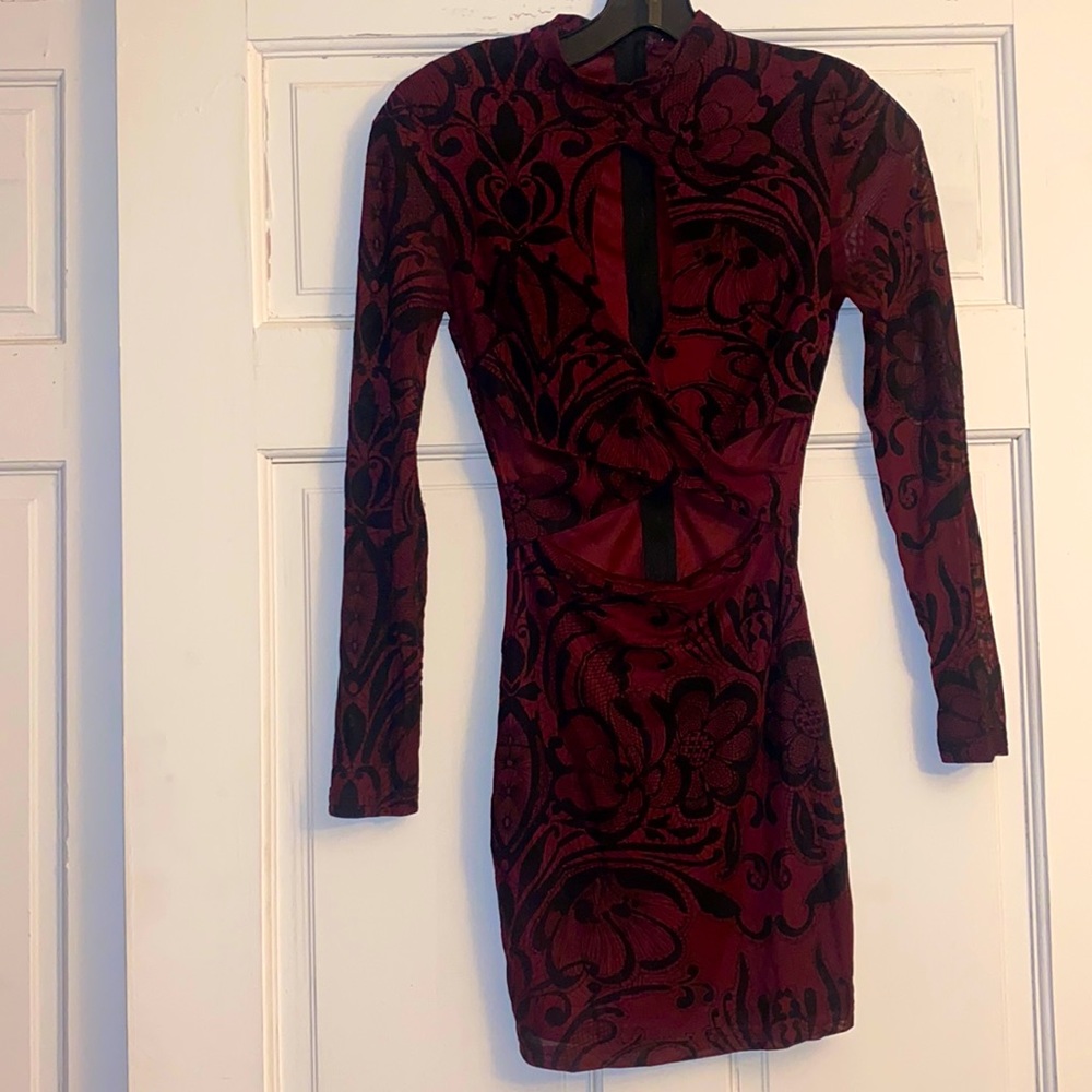 Long sleeved cut out mini dress
